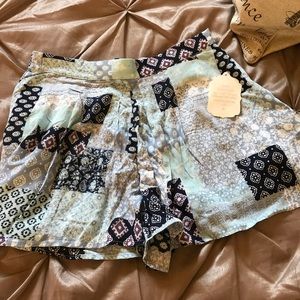 Altar’d State Flowy floral /patchwork shorts.